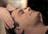 Image of Indian head massage session.