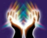 Image of hands radiating energy.